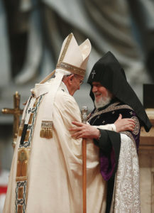 Pope Francis embraces Catholicos Karekin II, patriarch of the Armenian Apostolic Church, during a 2015 Mass in St. Peter’s Basilica at the Vatican to mark the 100th anniversary of the Armenian genocide. Ecumenical relations, the memory of past suffering and prayers for a future of peace form the framework for Pope Francis’ itinerary when he visits Armenia June 24-26. (CNS photo/Tony Gentile, Reuters)